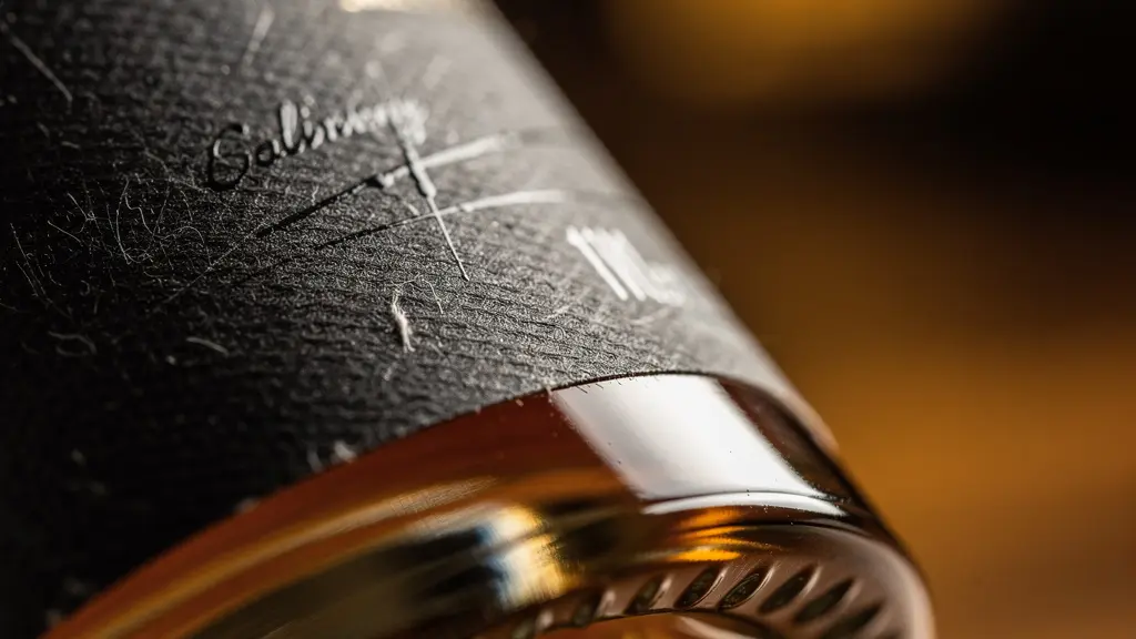 Close-up of distillery bottle label showing DSP number and production details